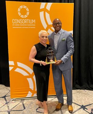 03-Josie-with-Commissioner-Davis_Outstanding-Partner-2023